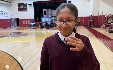 A young actress tries to stop smiling to portray the gloomy Wednesday Addams in the musical "The Addams Family."