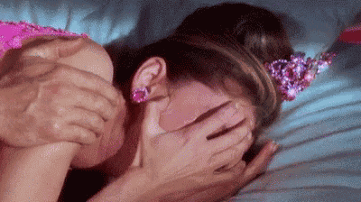 A GIF of Audrey Hepburn wiping away tears to represent the intensity and fumes of the Gustav Fouche Frizz Spritz salon treatment.