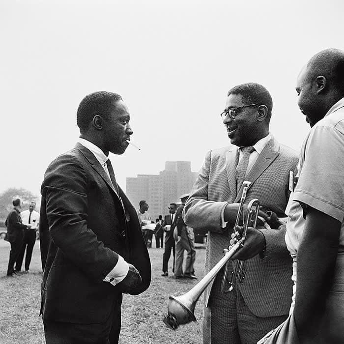 Dizzy Gillespie in conversation with Art Blakey at the Randall's Island Jazz Festival in New York City, 1958.