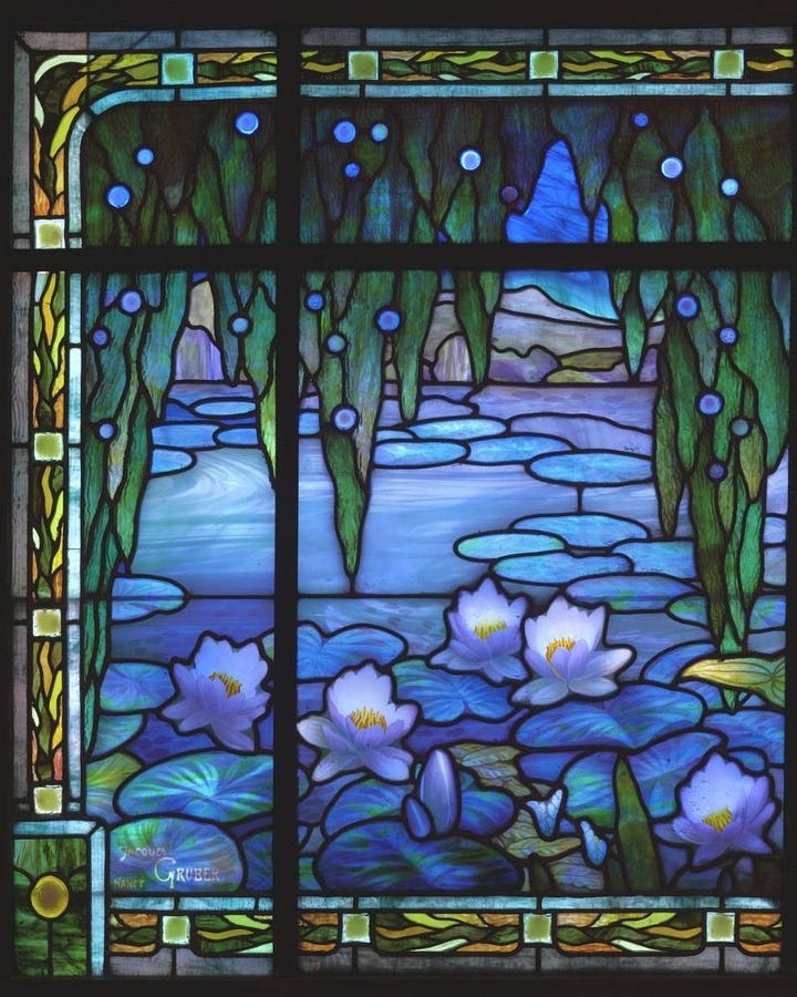 Two bold colorful stained glass artworks