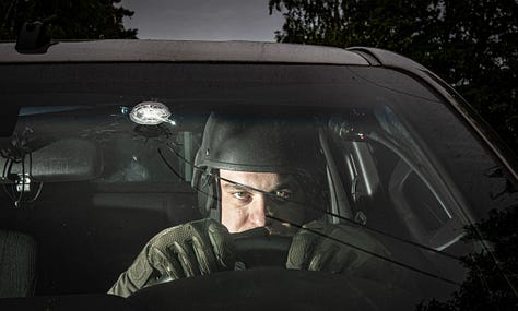 (1) An emergency worker helping in the evacuation of Vovchansk sits behind the steering wheel of a vehicle in May. Vovchansk was heavily shelled by Russian artillery whose forces crossed into Ukraine in what is reported to be an attempt to create a new front as part of their summer offensive. Simon Townsley—Panos Pictures. (2) Injured Russian soldiers at a hospital underground in Bakhmut, on Jan. 22. Nanna Heitmann—Magnum Photos. (3) Volunteers, including medics, help emergency and rescue personnel clear the rubble of a destroyed building at Ohmatdyt Children's Hospital following a Russian missile attack in Kyiv on July 8.Roman Pilipey—AFP/Getty Images.