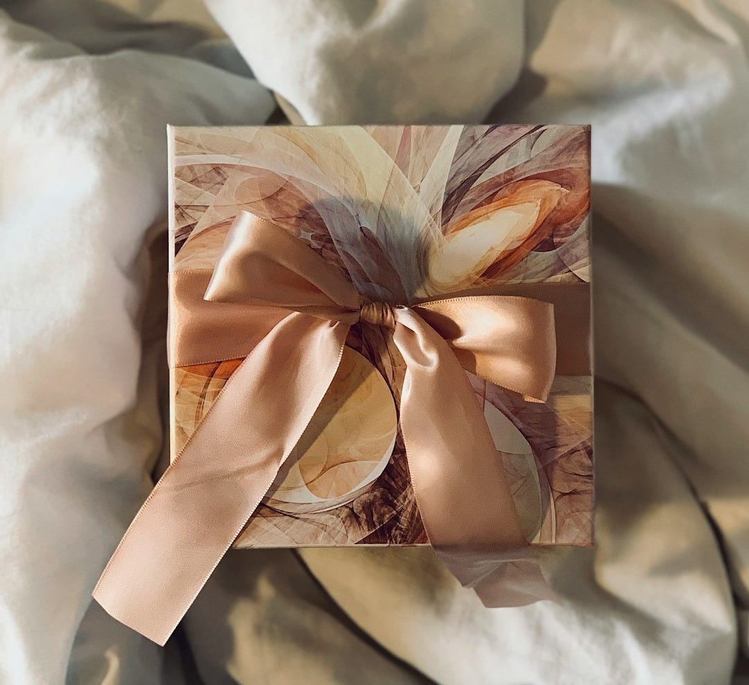 white and brown floral paper on white textile