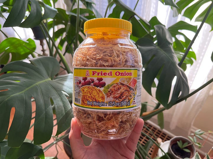 Fried onions on a salad and in a jar