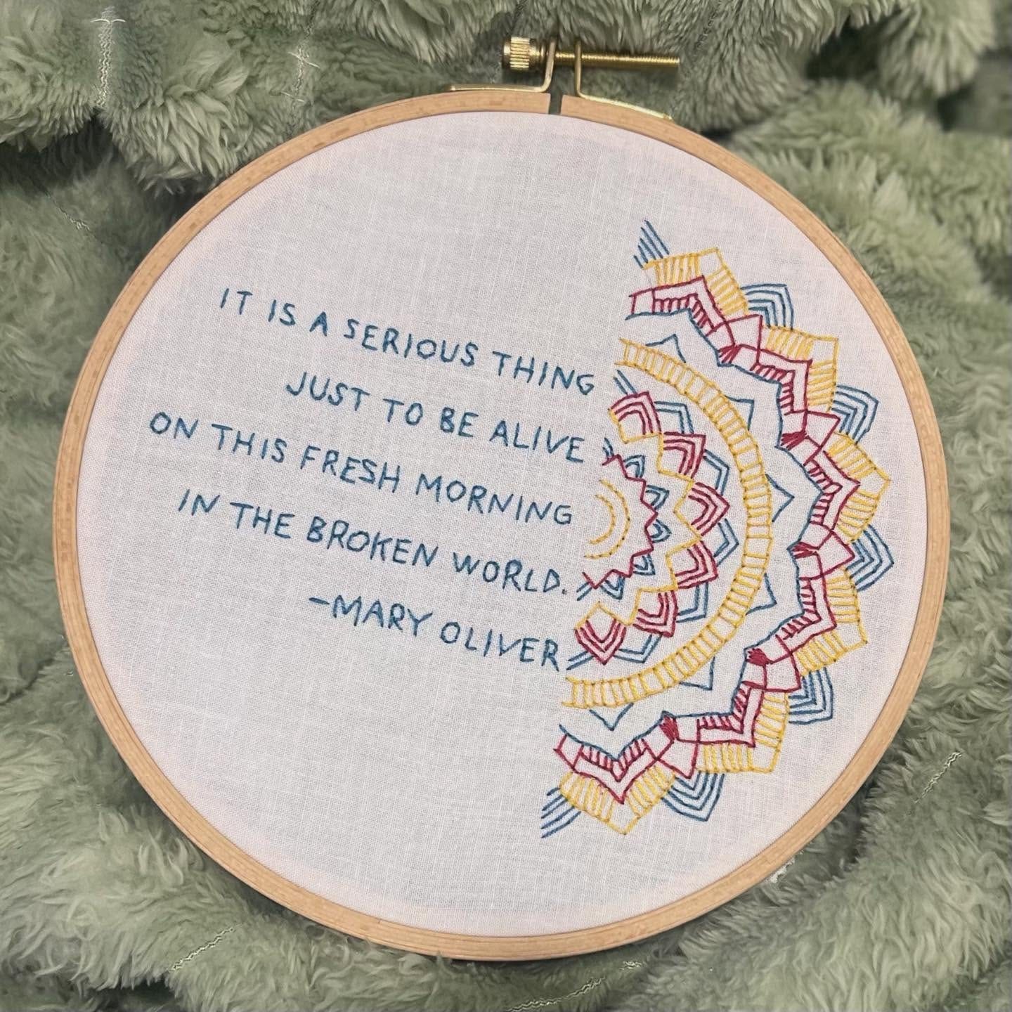 May be an image of ‎stitching and ‎text that says '‎ITIS ITISASERIOUS IT IS TISASERIOUS A SERIOUS THING JUST To BE ALIVE ONTHIS FRESH MORNING מס THIS INTHE IN THE BROKEN WORLD. -MARY OLIVER‎'‎‎