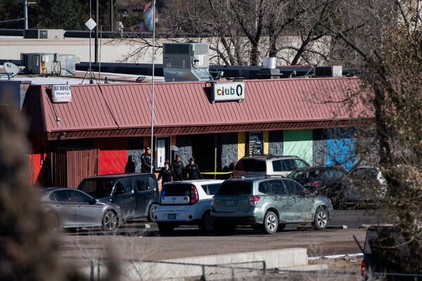 Police officers secured Club Q, the scene of the mass shooting, on Sunday.