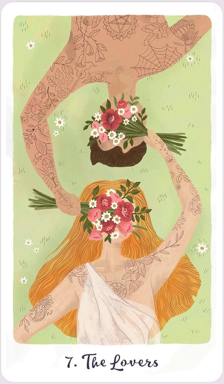 This may contain: two women with tattoos and flowers on their heads are holding each other's hands