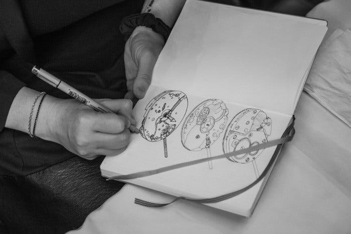  Photo by Atom Moore (NYC RedBar member caught drawing during the event) 