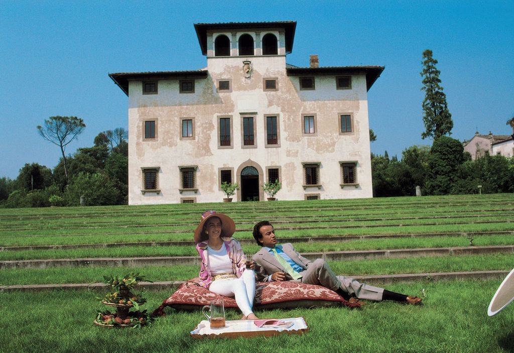 This image may contain Clothing Apparel Footwear Shoe High Heel Human Person Female Evening Dress Robe and Fashion