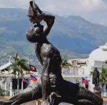 A statue of a person holding a baby

AI-generated content may be incorrect.