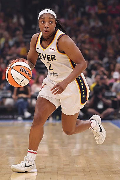 Aari McDonald of the Indiana Fever dribbles against the Chicago Sky during the second half at the United Center on July 27, 2025 in Chicago,...