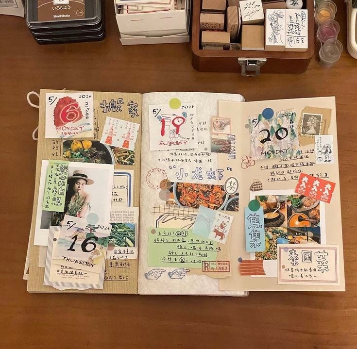 This may contain: an open book with pictures and stamps on it sitting on top of a wooden table This may contain: an open book with pictures and stamps on it sitting on top of a wooden table