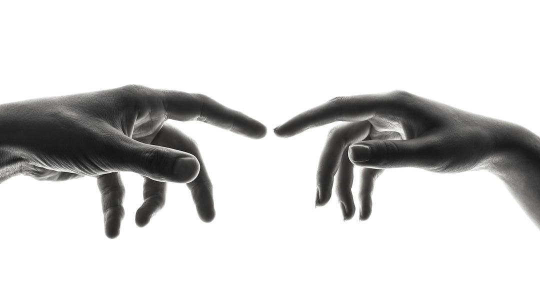 two person's connecting fingers two person's connecting fingers