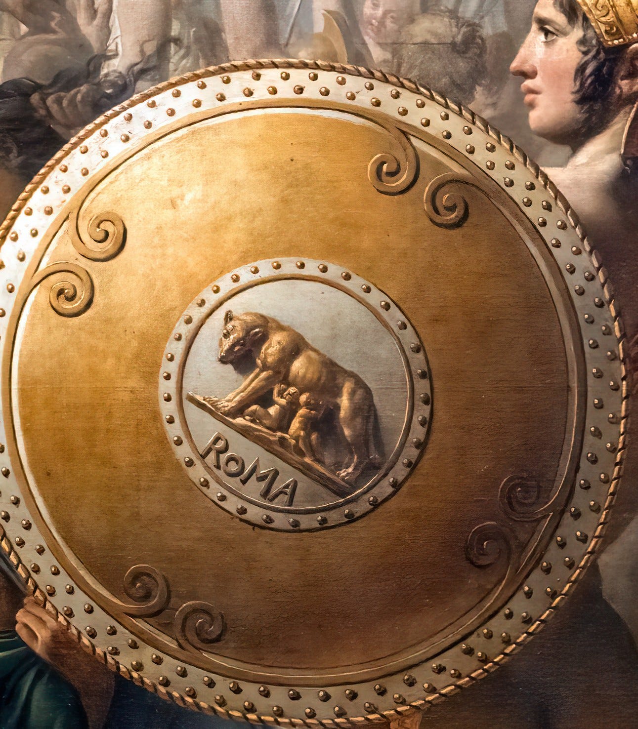 Jacques Louis David, The Intervention of the Sabine Women, 1799, Louvre, Paris. Detail: the shield of Romulus. Jacques Louis David, The Intervention of the Sabine Women, 1799, Louvre, Paris. Detail: the shield of Romulus.
