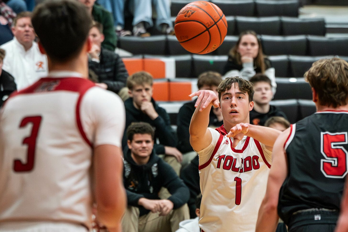 Toledo’s Adam Kruger (1) passes to a Eli Weeks (3) during a game against Mossyrock at Centralia High School on Wednesday, Feb. 11.