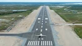 An airplane on a runway

AI-generated content may be incorrect.