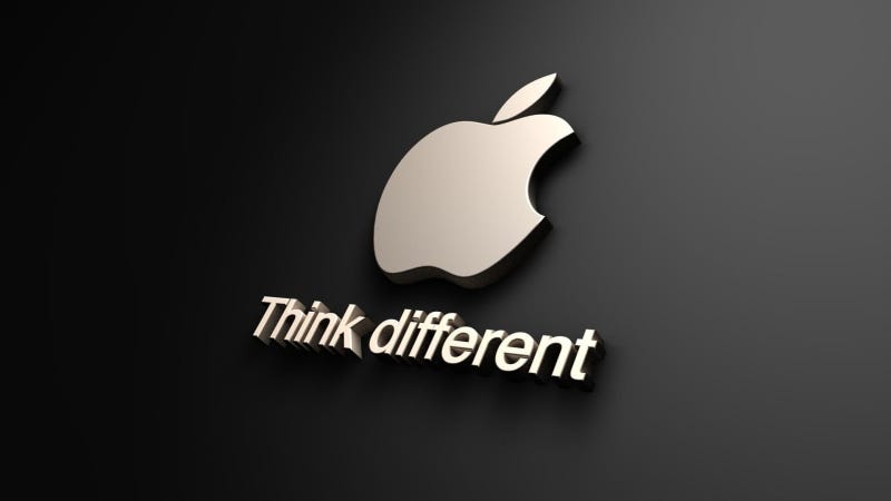 Apple logo with the “Think Different” slogan on a dark background