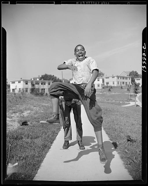 Boys playing leapfrog, Anacostia, DC, 1942.