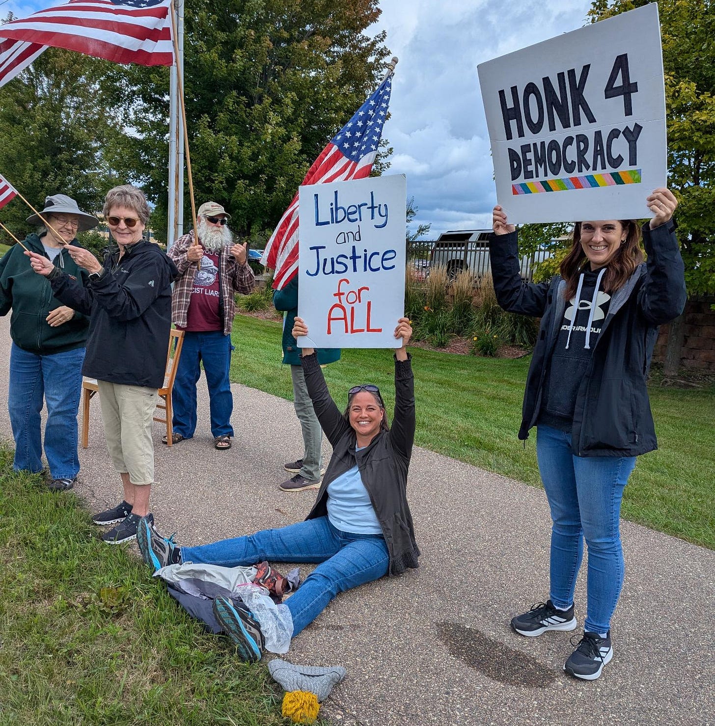 Photo of a woman protesting while icing her ankle Photo of a woman protesting while icing her ankle