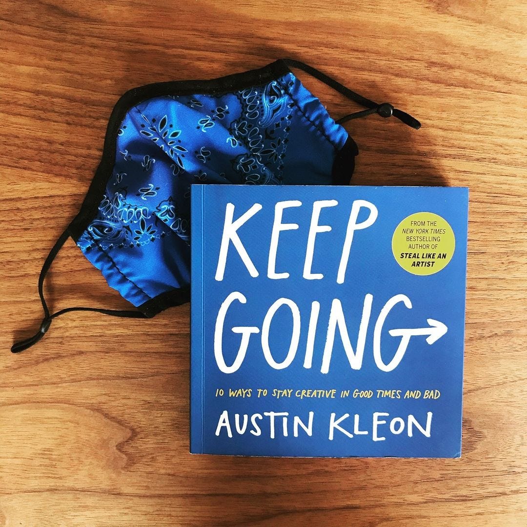 a photo of a mask and the book keep going