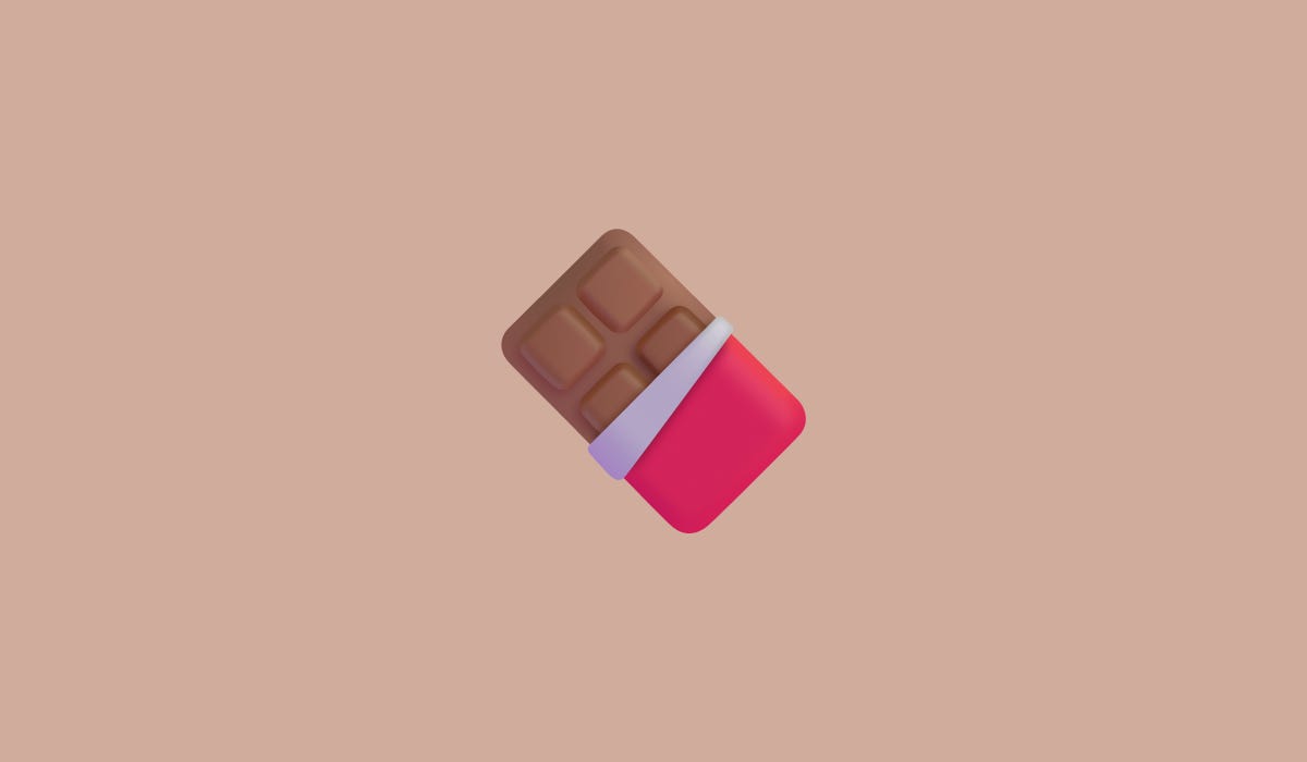 A chocolate bar on a light brown background