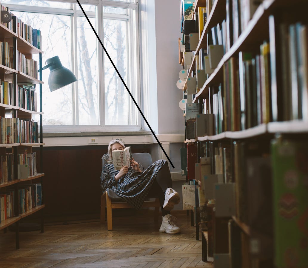 A woman reading in the library