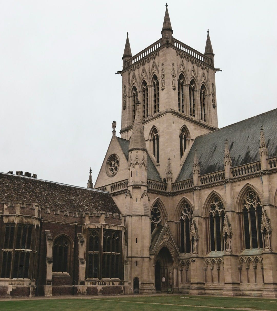 photography of white and gray church during daytime