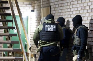 U.S. Immigration and Customs Enforcement officers wait to detain a person, Jan. 27, 2025, in Silver Spring, Md. (AP Photo/Alex Brandon, File) U.S. Immigration and Customs Enforcement officers wait to detain a person, Jan. 27, 2025, in Silver Spring, Md. (AP Photo/Alex Brandon, File)