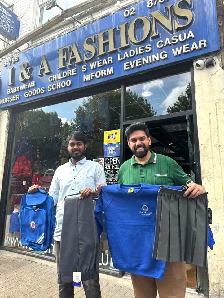 May be an image of ‎2 people and ‎text that says "‎HIO 02 CASUA WEAR 8488 T&A CHILDRE S WEAR LADIES ASHIONS EVENING EVENING NIFORM BABYWEAR GOODS SCHOO NURSER BAG nOK OPEN 930 630 MON MON-E ON- ATHBKOO الا‎"‎‎