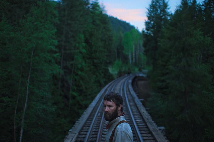 Stills from the new release films Wicked: For Good and Train Dreams.