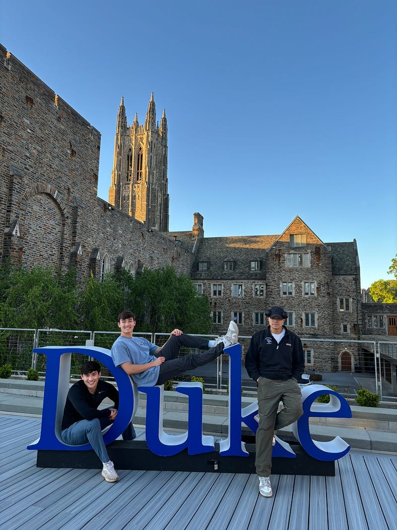 My younger brother (middle) and me (left) posing for a picture at Duke with our friend during a visit to campus in 2024.