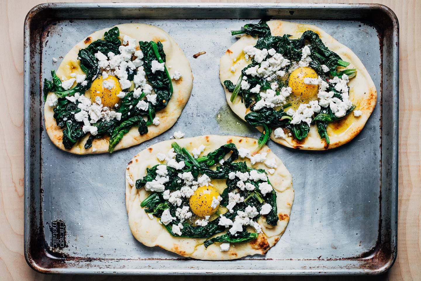 Flatbreads on a baking sheet