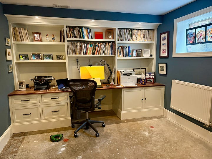 Two photos showing the "after" of a family room and office as part of a basement renovation with lights, paint, artwork, etc.