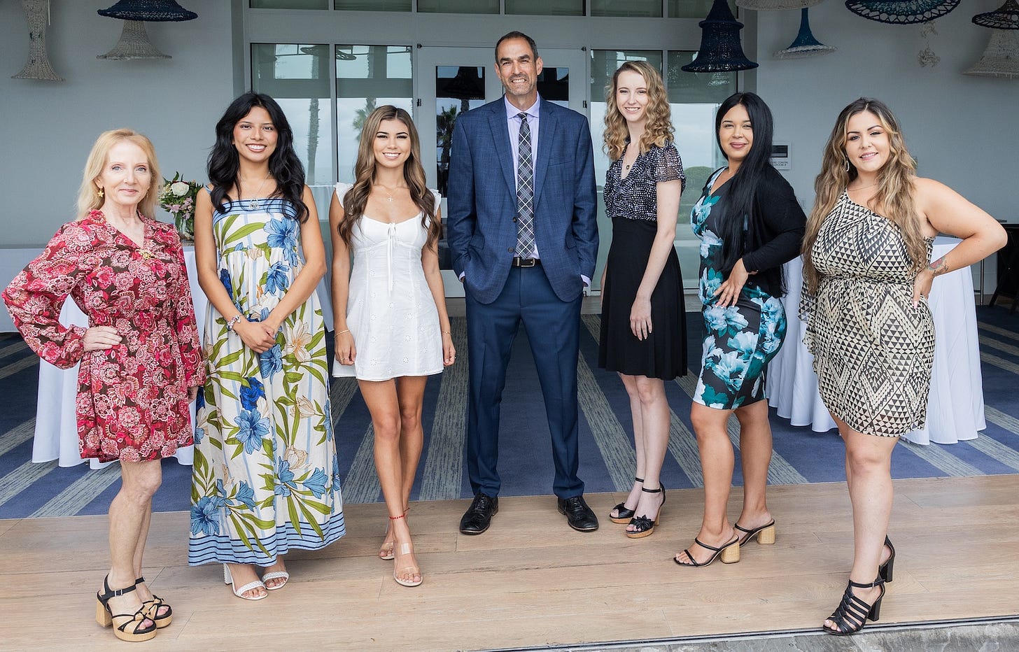 Oceanside Chamber of Commerce Chief Executive Officer Scott Ashton, middle, and his staff. The chamber will move to a new location early next year. Courtesy photo