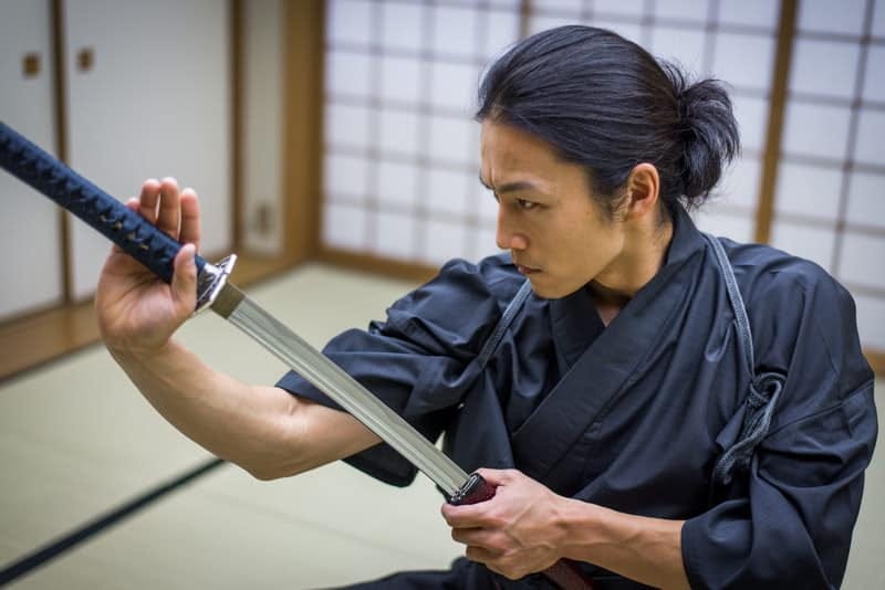 Samurai training in a traditional dojo in Tokyo - Samurai Swords Store