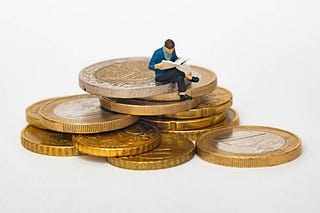 Why do people get paid to invest their money? 