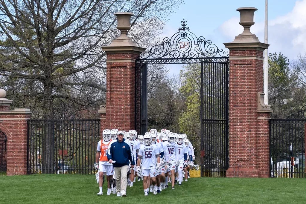 Men's Lacrosse vs. Holy Cross - Image 1: The Bison march ...