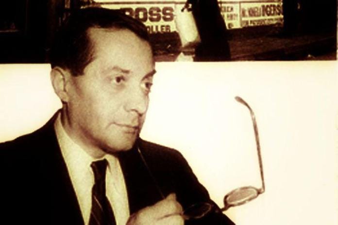 A person holding a pair of glasses Description automatically generated