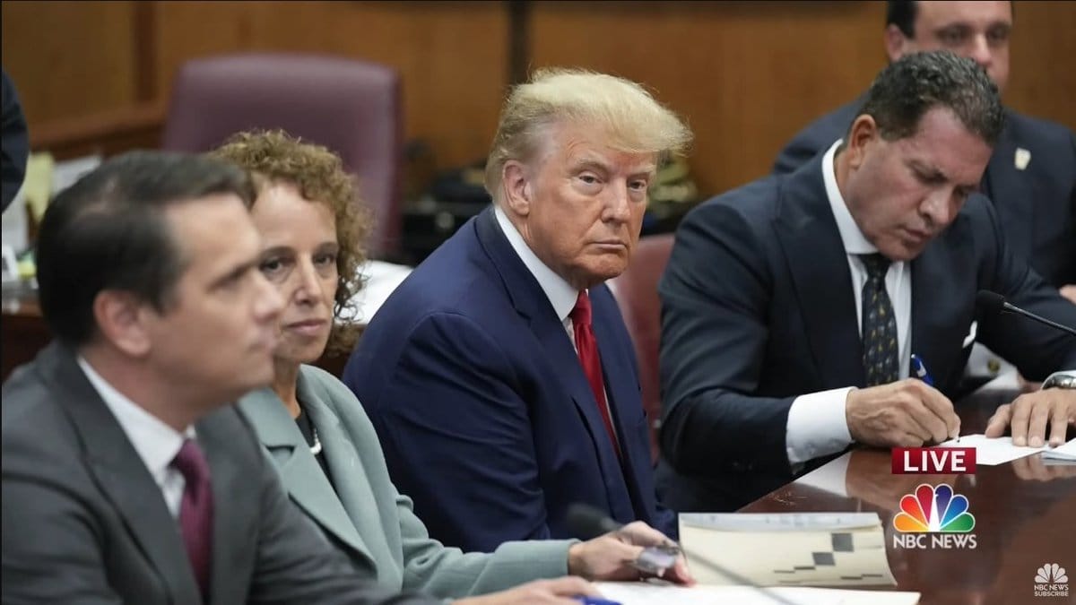 May be an image of 3 people and people standing