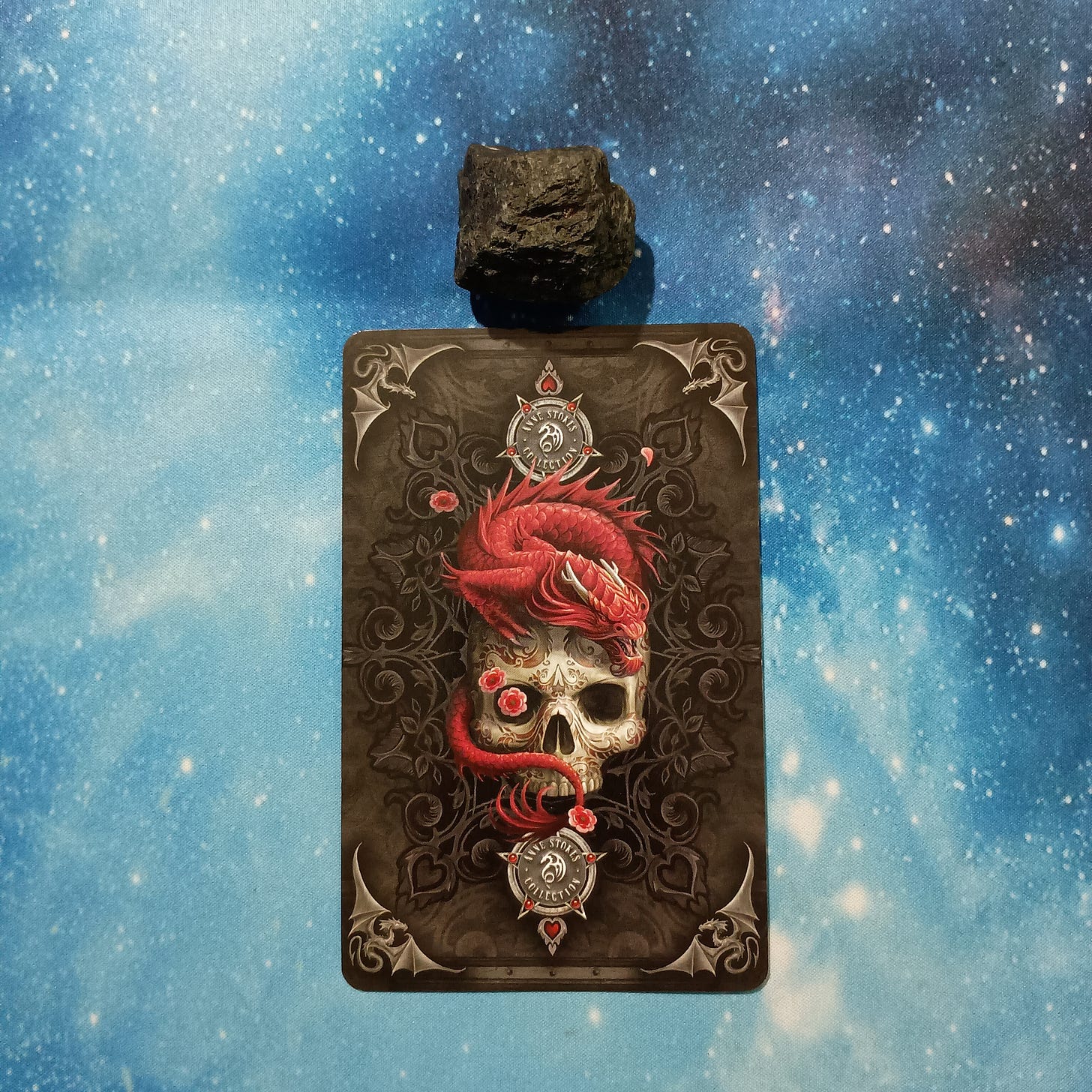 Full Moon Magic: Your August 2025 Pick-a-Card Tarot Reading, Pile 3, Black Tourmaline crystal on a starry blue background, and 1 oracle card, face down Full Moon Magic: Your August 2025 Pick-a-Card Tarot Reading, Pile 3, Black Tourmaline crystal on a starry blue background, and 1 oracle card, face down