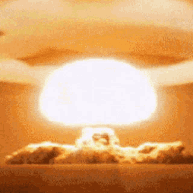 a nuclear explosion with a large mushroom cloud a nuclear explosion with a large mushroom cloud