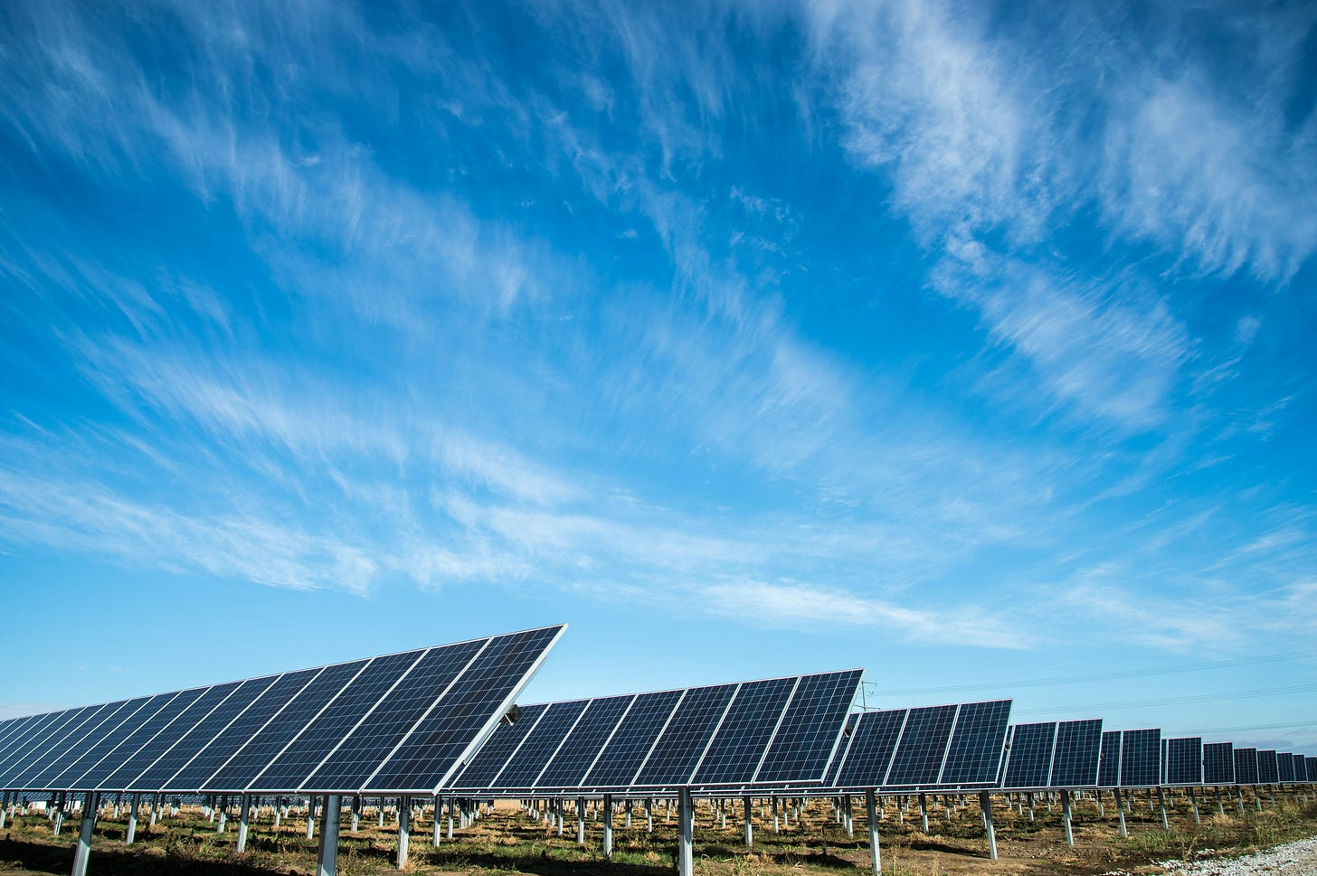 Solar panels in a large-scale solar farm illustrating growing industrial demand for silver