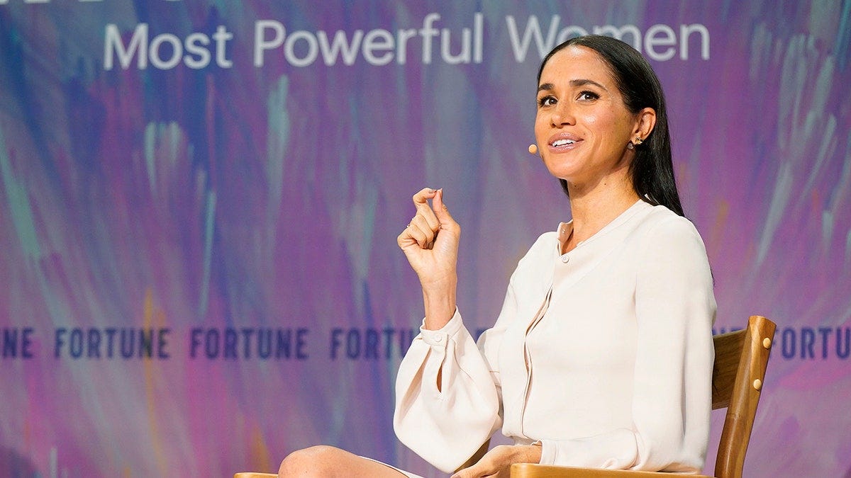 Meghan Markle discusses royal exit at summit with 'less than subtle jabs':  expert | Fox News