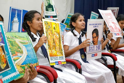 Children and Adults enjoying the Travelling History Museum's Exhibits