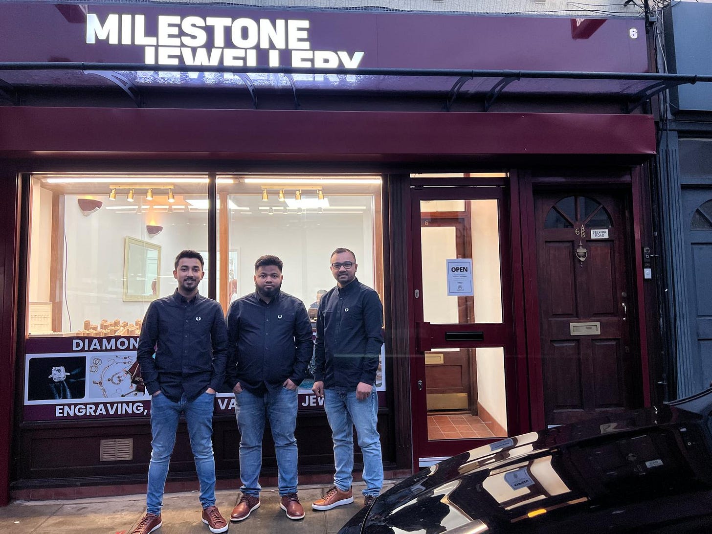 May be an image of 3 people and text