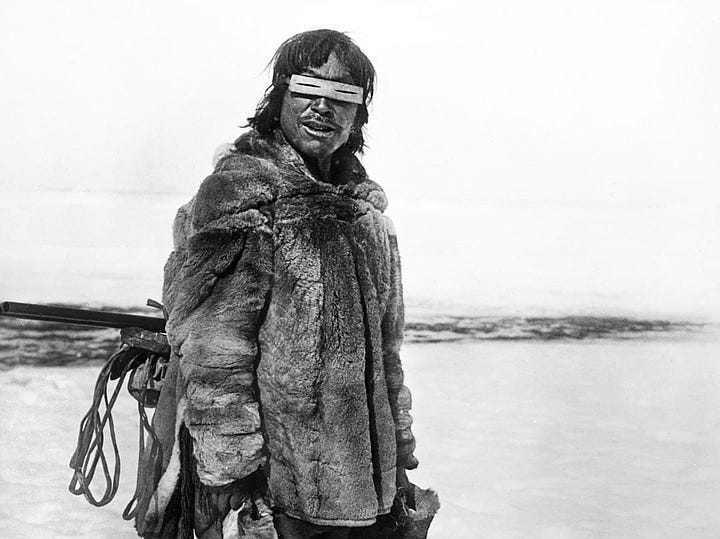 (L) Snow goggles were traditionally made of driftwood, bone, walrus ivory, caribou antler, or in some cases seashore grass. (R) smoky quartz glasses