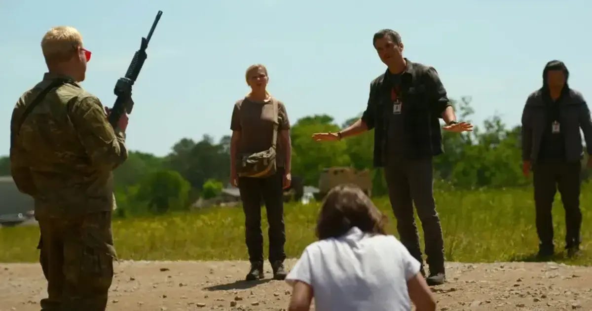 Screencap from a tense moment in the film when the journalists meet extremely dangerous militiamen.