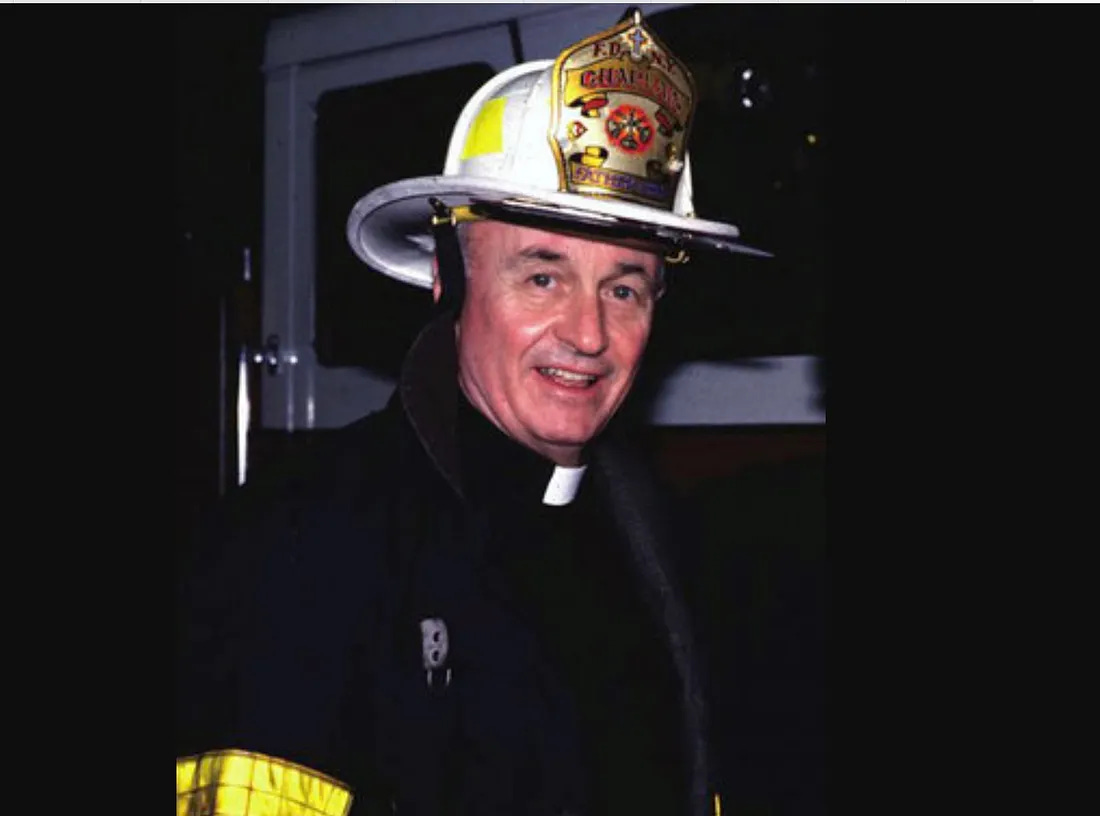 Father Mychal Judge in his FDNY chaplain’s helmet and turnout coat