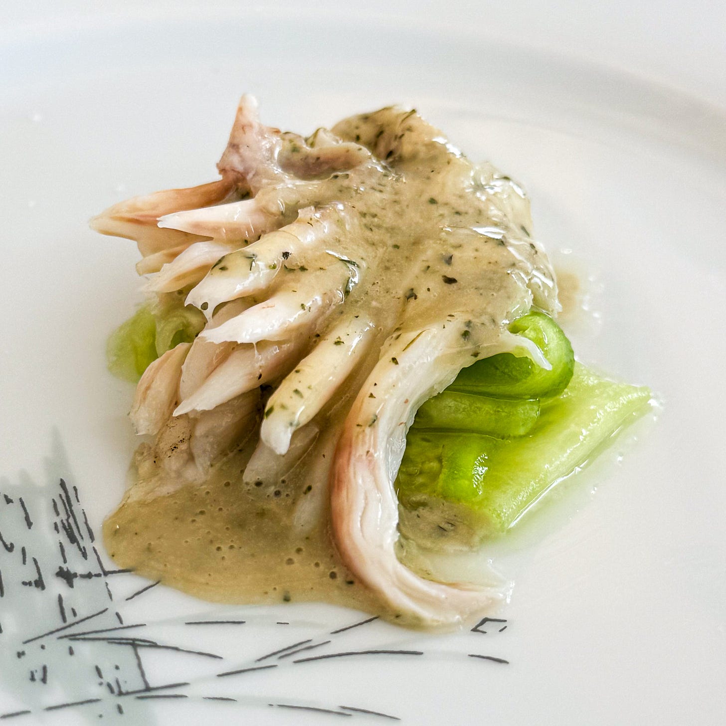 Grilled skate fanned over marinated cucumber with a herb sauce at Bittikesu, Paris 4th Grilled skate fanned over marinated cucumber with a herb sauce at Bittikesu, Paris 4th