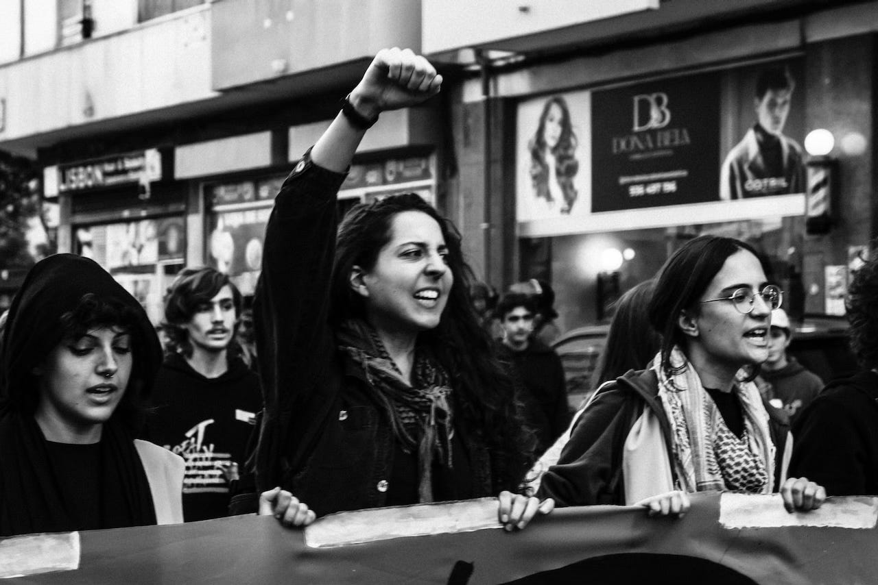 black and white image of climate protest by young activists in Lisbon