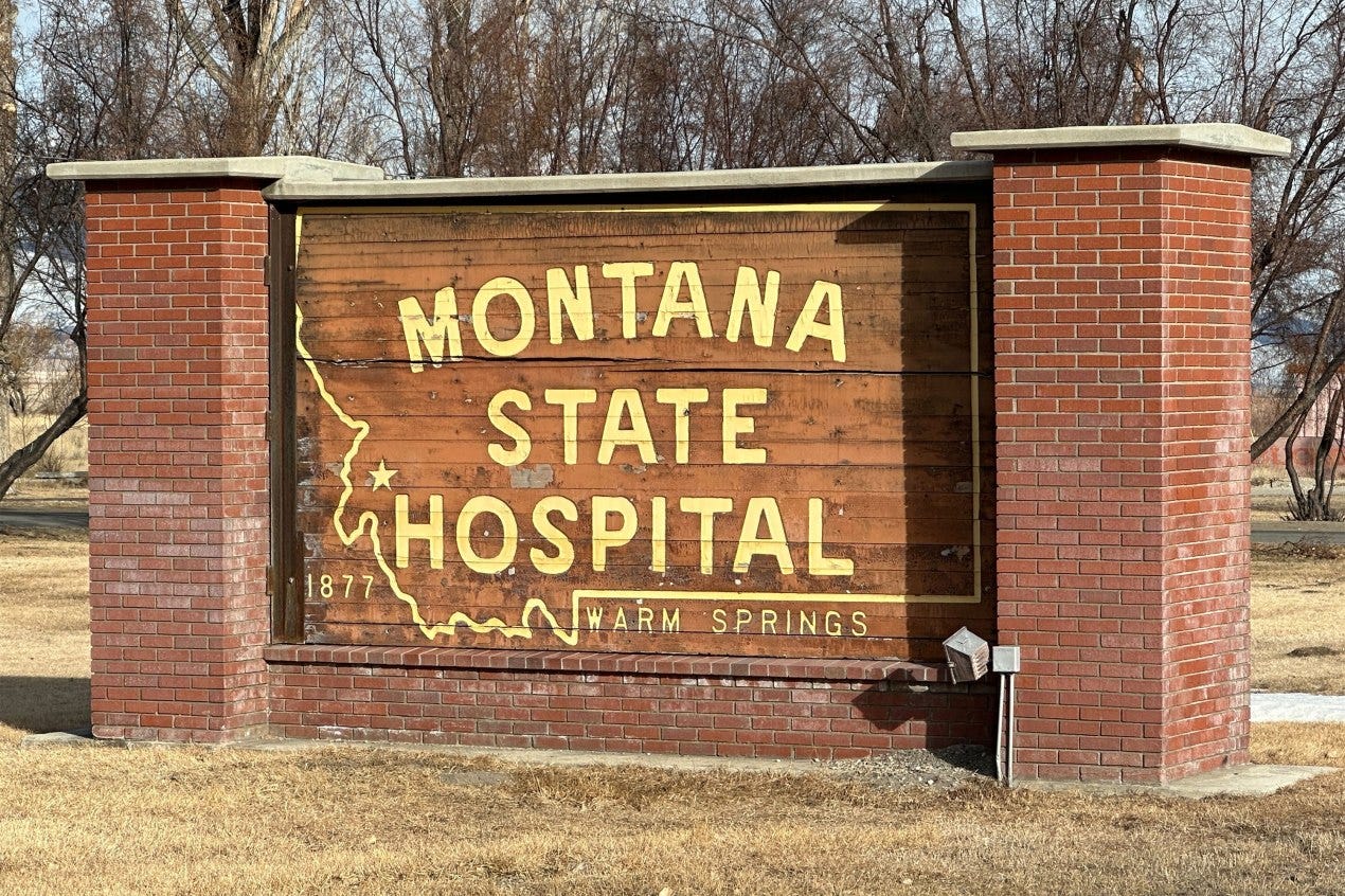 A photo of a sign that reads, "Montana State Hospital — Warm Springs." A photo of a sign that reads, "Montana State Hospital — Warm Springs."